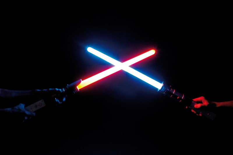 Illustration for article titled Thrustmaster's Glowing Lightsaber Wiimote Add-on Might Make Force Unleashed Bearable